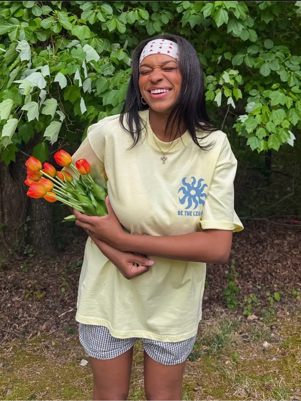 Pale Yellow Graphic Tee with Blue Sun Logo
